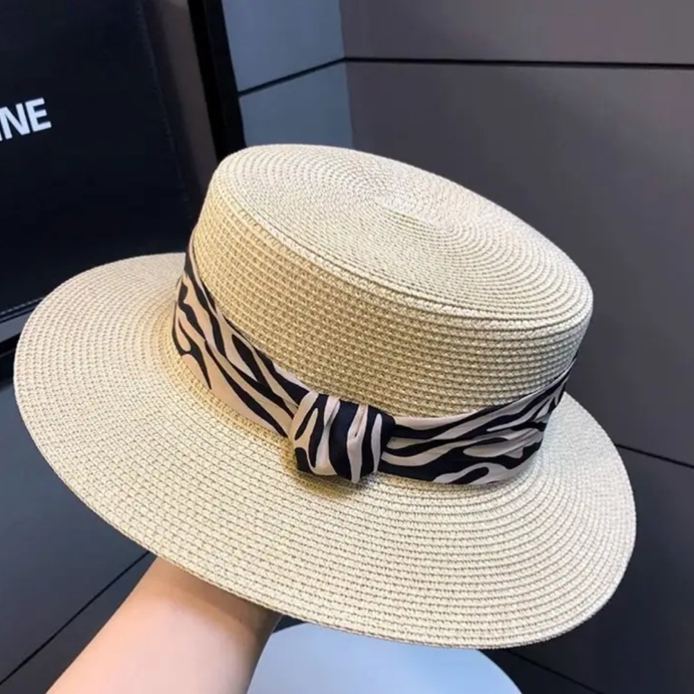Stylish Cream and Black Boater Hat with Zebra Accent